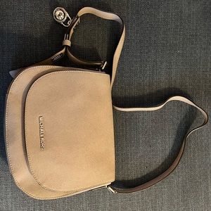 Authentic Michael Kors crossbody saddle bag/silver grey color